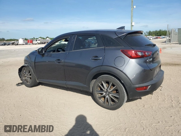2017 Mazda CX-3 Touring z VIN JM1DKDC77H0151148, wystawiony jako Copart lot #81897434 z przebiegiem Nie podano mil oraz Szkoda całkowita • Salvage title. Historia ofert i sprzedaży dostępna na DreamBid. Obrazek 2.