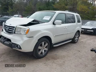 2014 Honda Pilot Touring with VIN 5FNYF4H91EB041614, listed as a IAAI auction lot 42050405 with 158,236 mi miles and . Bid and sale history available at DreamBid. Image 17.
