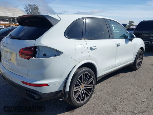 2017 Porsche Cayenne with VIN WP1AA2A23HKA80695, listed as a IAAI auction lot 41532359 with 71,628 mi miles. Bid and sale history available at carsss.com. Image 4.