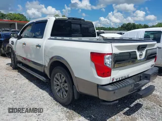 2017 Nissan Titan SV with VIN 1N6AA1E63HN526560, listed as a IAAI auction lot 42487006 with 155,505 mi miles and . Bid and sale history available at DreamBid. Image 3.
