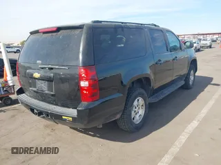2013 Chevrolet Suburban LS with VIN 1GNSKHE71DR332335, listed as a IAAI auction lot 41408949 with 167,860 mi miles. Bid and sale history available at carsss.com. Image 4.
