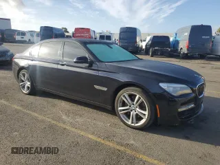 2014 BMW 7 Series 740Li with VIN WBAYE4C50ED137813, listed as a Copart auction lot 80801994 with 159,726 mi miles and Clean Title. Bid and sale history available at carsss.com. Image 4.