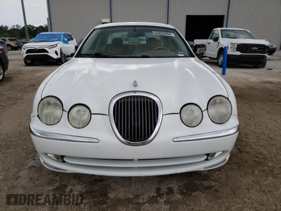 2000 Jaguar S-Type V6 z VIN SAJDA01C0YFL51640, wystawiony jako Copart lot #48708915 z przebiegiem 186 034 mil mil oraz Nie do naprawy • Non repairable. Historia ofert i sprzedaży dostępna na DreamBid. Obrazek 5.