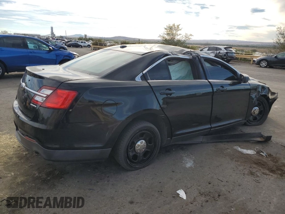 2014 Ford Police Interceptor with VIN 1FAHP2L8XEG148883, listed as a Copart auction lot 77468884 with Not provided miles and Salvage title. Bid and sale history available at DreamBid. Image 3.