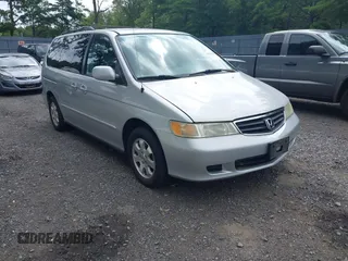 2003 Honda Odyssey EX-L with VIN 5FNRL18043B146173, listed as a IAAI auction lot 42738156 with 154,880 mi miles and . Bid and sale history available at DreamBid. Image 1.