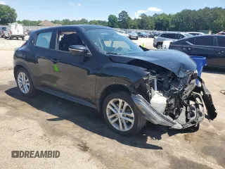2015 Nissan Juke SV with VIN JN8AF5MV5FT558184, listed as a Copart auction lot 57761285 with 57,025 mi miles and Salvage title. Bid and sale history available at DreamBid. Image 4.