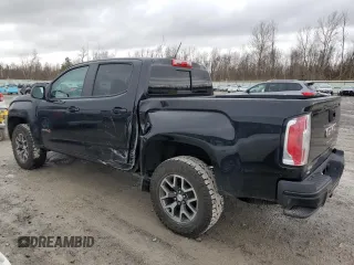 2022 GMC Canyon 4WD AT4 w/Leather with VIN 1GTG6FEN5N1279158, listed as a Copart auction lot 50958545 with 34,569 mi miles and Salvage Title. Bid and sale history available at carsss.com. Image 2.