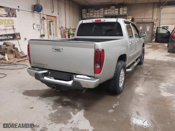 2012 Chevrolet Colorado LT w/1LT with VIN 1GCHTCFE7C8140292, listed as a IAAI auction lot 41620037 with 222,806 mi miles. Bid and sale history available at carsss.com. Image 4.