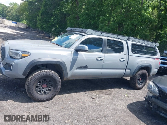 2021 Toyota Tacoma SR5 with VIN 3TMDZ5BN3MM112338, listed as a IAAI auction lot 42241704 with 81,346 mi miles and . Bid and sale history available at DreamBid. Image 14.