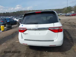 2011 Honda Odyssey EX-L with VIN 5FNRL5H67BB070541, listed as a IAAI auction lot 41812554 with 150,898 mi miles and . Bid and sale history available at DreamBid. Image 16.