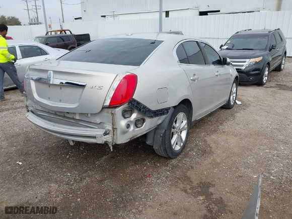 2009 Lincoln MKS with VIN 1LNHM93R79G626392, listed as a IAAI auction lot 41713232 with 130,136 mi miles. Bid and sale history available at carsss.com. Image 4.