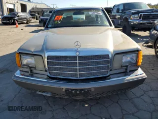1990 Mercedes-Benz 420 with VIN WDBCA35E3LA500747, listed as a Copart auction lot 74351004 with 132,480 mi miles and Clean Title. Bid and sale history available at carsss.com. Image 5.