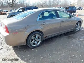 2008 Chevrolet Malibu LT w/1LT with VIN 1G1ZH57B48F225771, listed as a IAAI auction lot 41880804 with 174,755 mi miles. Bid and sale history available at carsss.com. Image 4.