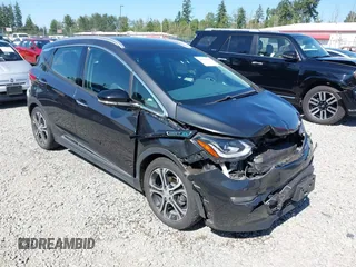 2017 Chevrolet Bolt EV Premier z VIN 1G1FX6S05H4190932, wystawiony jako IAAI lot #42422197 z przebiegiem 59 836 mil mil oraz . Historia ofert i sprzedaży dostępna na DreamBid. Obrazek 1.