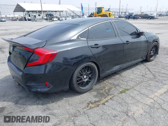 2021 Honda Civic Sport with VIN 2HGFC2F88MH557221, listed as a IAAI auction lot 42161778 with 101,956 mi miles and . Bid and sale history available at DreamBid. Image 4.