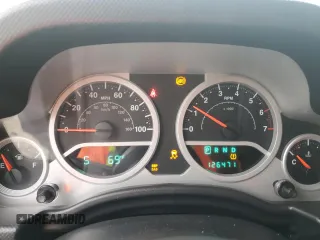 2010 Jeep Wrangler Unlimited Sahara with VIN 1J4BA5H17AL117410, listed as a Copart auction lot 88519555 with 126,471 mi miles and Salvage Title. Bid and sale history available at carsss.com. Image 9.
