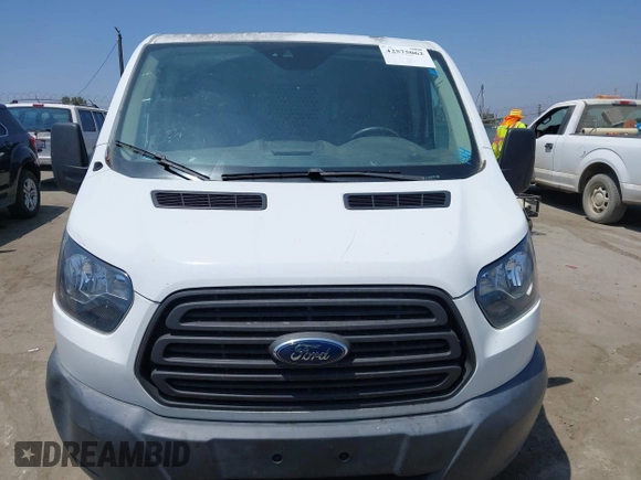2018 Ford Transit z VIN 1FTYE1YM3JKA17396, wystawiony jako IAAI lot #42575062 z przebiegiem 68 063 mil mil oraz . Historia ofert i sprzedaży dostępna na DreamBid. Obrazek 12.