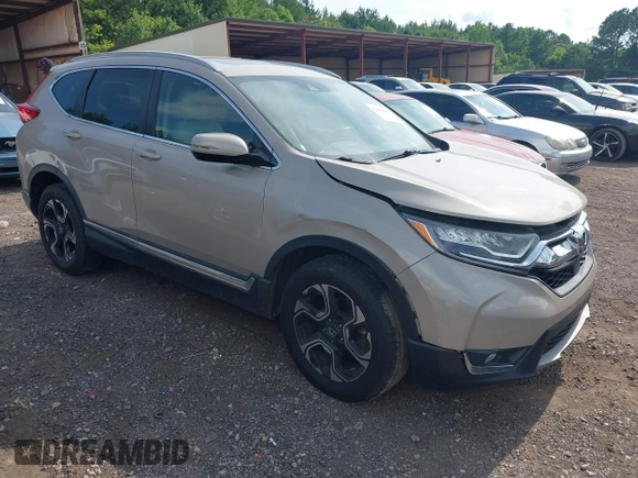 2018 Honda CR-V Touring with VIN 5J6RW2H96JL000910, listed as a IAAI auction lot 42490580 with 201,534 mi miles and . Bid and sale history available at DreamBid. Image 1.