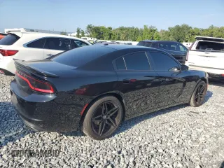 2019 Dodge Charger SXT with VIN 2C3CDXBG1KH697184, listed as a Copart auction lot 54313085 with 108,518 mi miles and Clean Title. Bid and sale history available at carsss.com. Image 3.
