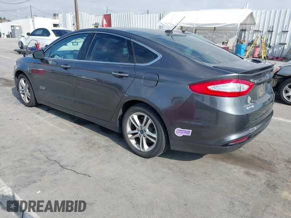 2016 Ford Fusion Titanium with VIN 3FA6P0SU9GR145186, listed as a IAAI auction lot 42023484 with 84,399 mi miles and . Bid and sale history available at DreamBid. Image 3.