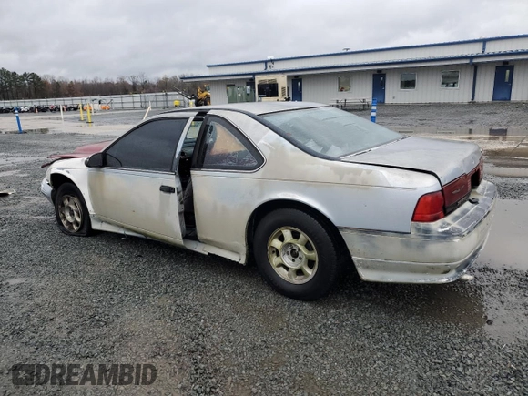 1990 Ford Thunderbird with VIN 1FAPP6046LH182637, listed as a Copart auction lot 82300484 with 149,365 mi miles and Salvage Title. Bid and sale history available at DreamBid. Image 2.