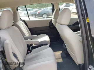 2012 Mazda 5 Touring z VIN JM1CW2CL5C0126744, wystawiony jako IAAI lot #42385667 z przebiegiem 140 150 mil mil oraz . Historia ofert i sprzedaży dostępna na DreamBid. Obrazek 8.