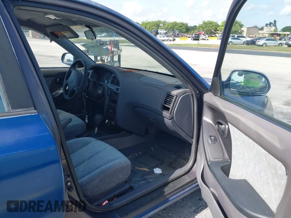 2003 Hyundai Elantra GLS z VIN KMHDN45D53U476937, wystawiony jako IAAI lot #42286976 z przebiegiem Nie podano mil oraz . Historia ofert i sprzedaży dostępna na DreamBid. Obrazek 5.