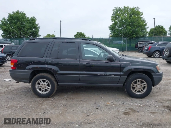 2004 Jeep Grand Cherokee Laredo z VIN 1J4GW48S54C198115, wystawiony jako IAAI lot #42351240 z przebiegiem 189 416 mil mil oraz . Historia ofert i sprzedaży dostępna na DreamBid. Obrazek 14.