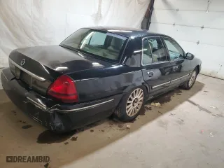 2010 Mercury Grand Marquis LS with VIN 2MEBM7FV6AX628705, listed as a Copart auction lot 52185105 with 139,485 mi miles and Salvage Title. Bid and sale history available at carsss.com. Image 3.