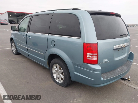 2010 Chrysler Town & Country Touring with VIN 2A4RR5D18AR343699, listed as a IAAI auction lot 42035736 with 222,807 mi miles and . Bid and sale history available at DreamBid. Image 3.