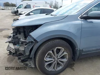2020 Honda CR-V EX with VIN 7FARW1H58LE003895, listed as a IAAI auction lot 41841608 with 56,757 mi miles and . Bid and sale history available at carsss.com. Image 18.