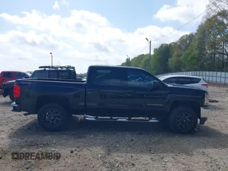 2017 Chevrolet Silverado 1500 LT with VIN 3GCUKREC3HG351205, listed as a IAAI auction lot 41961127 with 71,653 mi miles and . Bid and sale history available at DreamBid. Image 13.