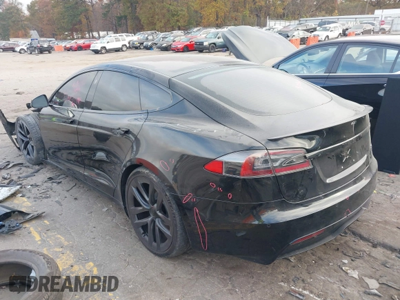 2022 Tesla Model S Plaid with VIN 5YJSA1E6XNF460235, listed as a IAAI auction lot 40951359 with 18,922 mi miles and . Bid and sale history available at DreamBid. Image 3.