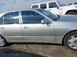 2003 Lexus LS 430 z VIN JTHBN30F630120730, wystawiony jako IAAI lot #41684308 z przebiegiem 224 189 mil mil oraz . Historia ofert i sprzedaży dostępna na DreamBid. Obrazek 14.