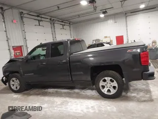 2016 Chevrolet Silverado 1500 LT with VIN 1GCVKREC0GZ303387, listed as a IAAI auction lot 41978237 with 123,692 mi miles and . Bid and sale history available at DreamBid. Image 14.