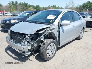 2009 Toyota Yaris with VIN JTDBT903X91300439, listed as a IAAI auction lot 42105998 with 195,880 mi miles. Bid and sale history available at carsss.com. Image 2.