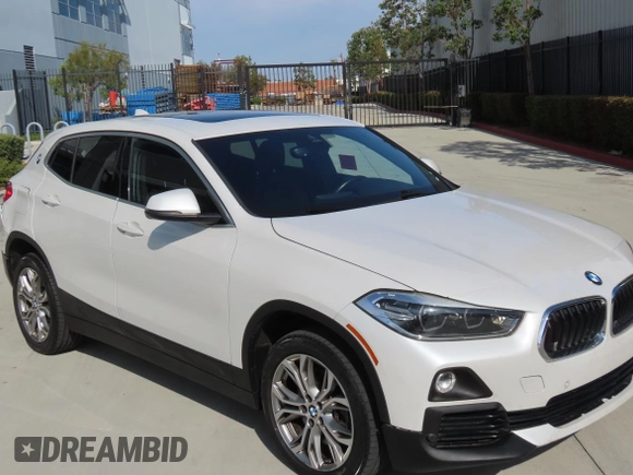 2019 BMW X2 sDrive28i with VIN WBXYJ3C57KEP77485, listed as a Copart auction lot 53721305 with 80,811 mi miles and Salvage Title. Bid and sale history available at carsss.com. Image 1.