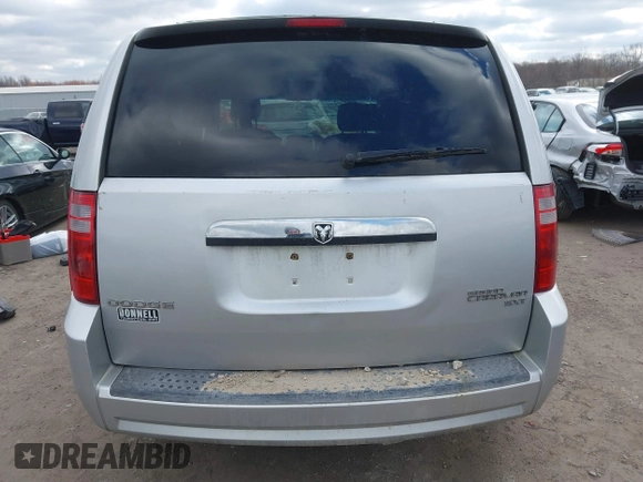 2010 Dodge Grand Caravan SXT with VIN 2D4RN5D13AR180609, listed as a IAAI auction lot 41857215 with Not Provided miles and . Bid and sale history available at DreamBid. Image 16.