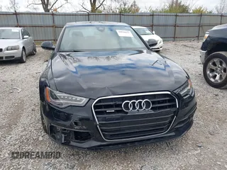 2013 Audi A6 3.0T Prestige with VIN WAUHGAFCXDN053087, listed as a IAAI auction lot 40840631 with 62,567 mi miles. Bid and sale history available at carsss.com. Image 6.