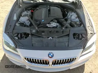 2017 BMW 6 Series 640i z VIN WBA6D0C51HG639445, wystawiony jako Copart lot #58412875 z przebiegiem 22 698 mil mil oraz Szkoda całkowita • Salvage title. Historia ofert i sprzedaży dostępna na DreamBid. Obrazek 15.