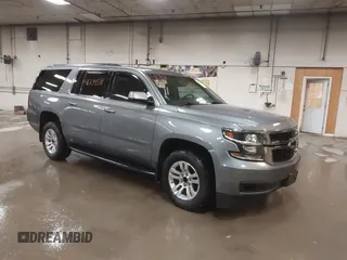 2019 Chevrolet Suburban LT with VIN 1GNSKHKC3KR195042, listed as a IAAI auction lot 41704591 with 107,166 mi miles and . Bid and sale history available at DreamBid. Image 1.