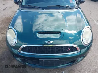 2009 MINI Hardtop S with VIN WMWMF73599TW83678, listed as a IAAI auction lot 42750705 with 95,278 mi miles and . Bid and sale history available at DreamBid. Image 6.