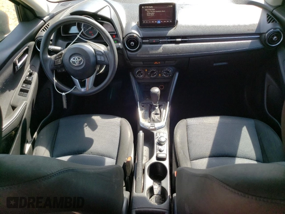 2018 Toyota Yaris with VIN 3MYDLBYV0JY326720, listed as a Copart auction lot 52027505 with 105,127 mi miles and Salvage Title. Bid and sale history available at DreamBid. Image 8.