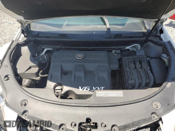 2014 Cadillac SRX z VIN 3GYFNAE32ES543932, wystawiony jako Copart lot #54256435 z przebiegiem 169 621 mil mil oraz Szkoda całkowita • Salvage title. Historia ofert i sprzedaży dostępna na DreamBid. Obrazek 12.