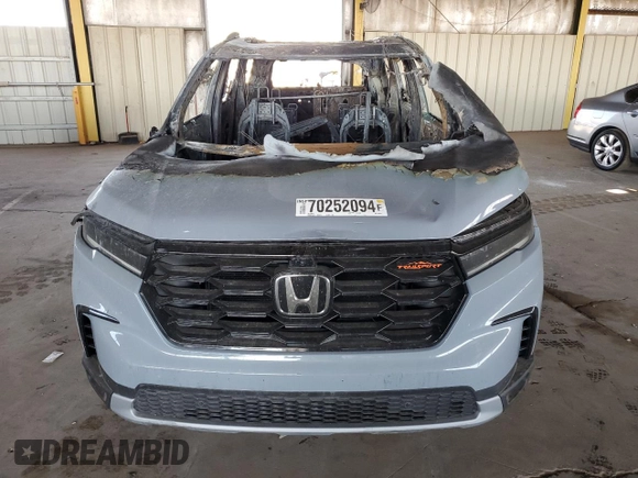 2023 Honda Pilot TrailSport with VIN 5FNYG1H68PB048581, listed as a Copart auction lot 70252094 with 0 mi miles and Salvage Title. Bid and sale history available at carsss.com. Image 5.
