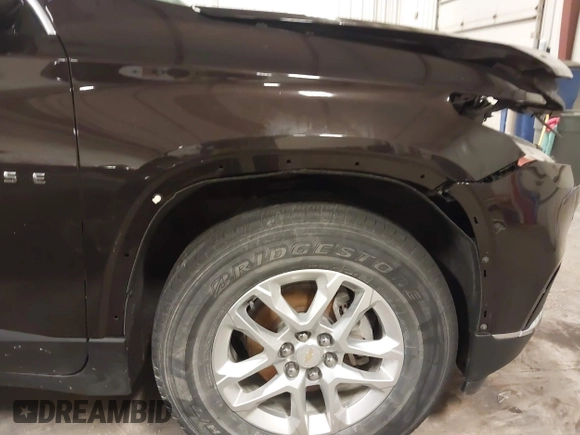 2019 Chevrolet Traverse LT Cloth z VIN 1GNERGKW1KJ158891, wystawiony jako IAAI lot #41996781 z przebiegiem 90 252 mil mil oraz . Historia ofert i sprzedaży dostępna na DreamBid. Obrazek 20.