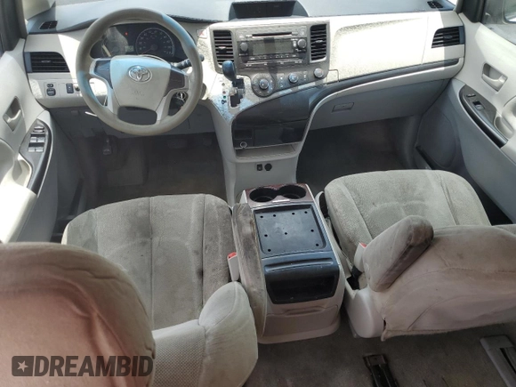 2014 Toyota Sienna L with VIN 5TDZK3DC3ES430634, listed as a Copart auction lot 60715375 with 122,621 mi miles and Salvage title. Bid and sale history available at DreamBid. Image 8.