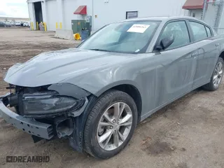 2023 Dodge Charger SXT with VIN 2C3CDXJG1PH632408, listed as a IAAI auction lot 42006263 with 24,295 mi miles. Bid and sale history available at carsss.com. Image 2.