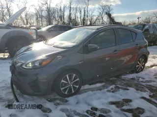 2018 Toyota Prius One with VIN JTDKDTB34J1607469, listed as a Copart auction lot 86483764 with 56,711 mi miles and Salvage title. Bid and sale history available at DreamBid. Image 1.