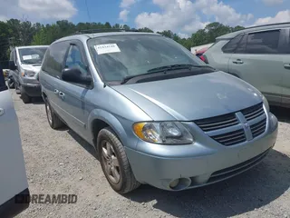 2005 Dodge Caravan SXT with VIN 2D4GP44L35R143613, listed as a IAAI auction lot 42434548 with 291,474 mi miles and . Bid and sale history available at DreamBid. Image 1.